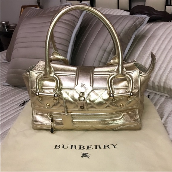 Burberry Handbags - Authentic Burberry large metallic leather purse